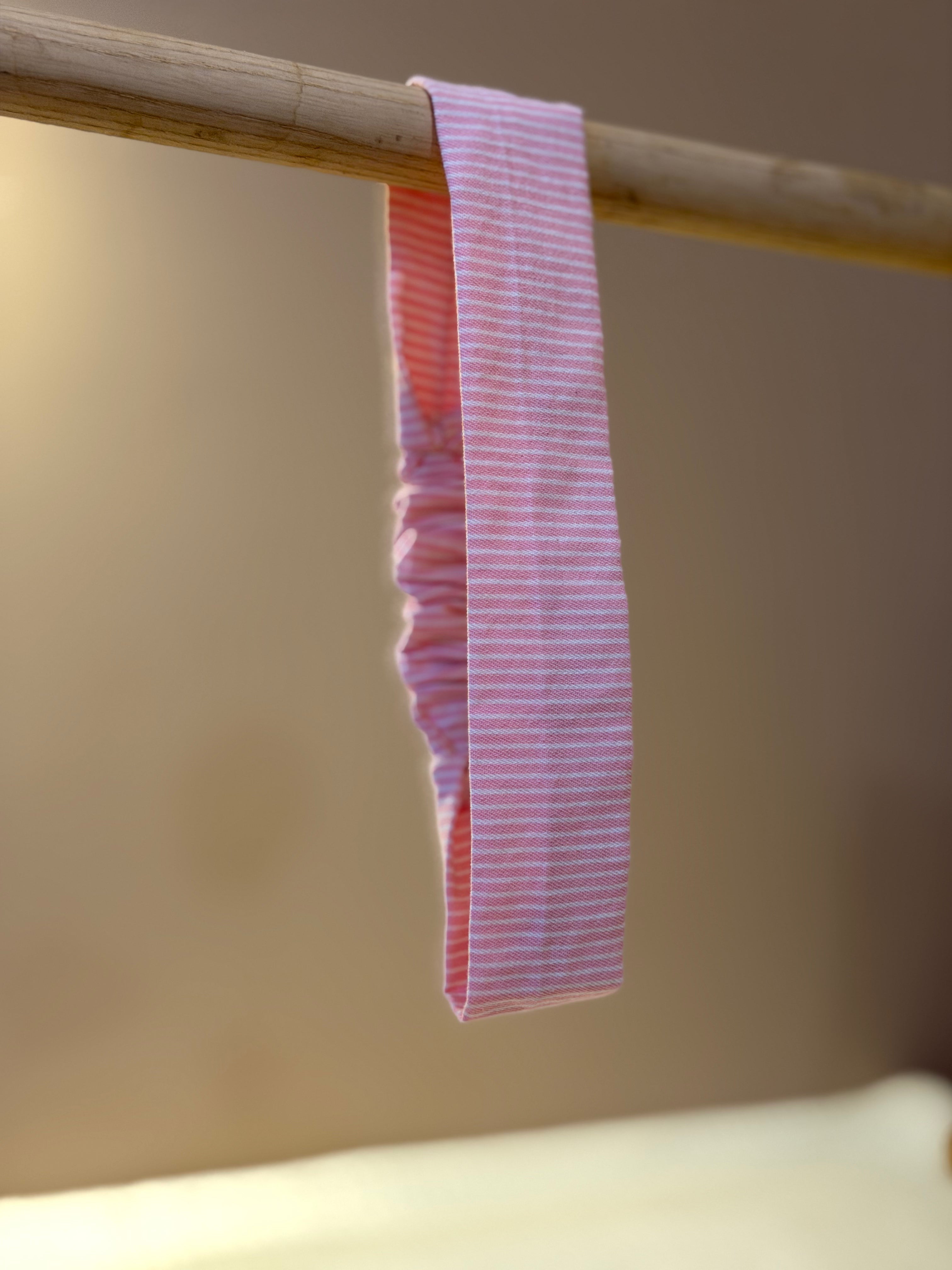 Bandeau à rayure rose et blanche